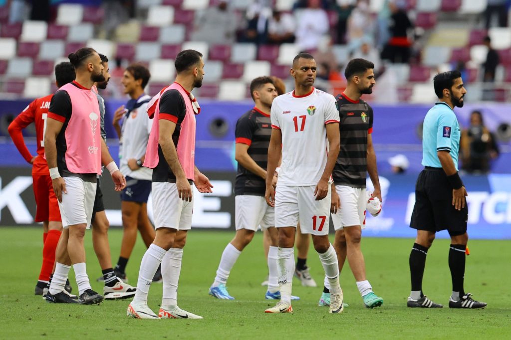 约旦球员在输球后显得失望，但无阻以小组第三晋级——照片：路透社