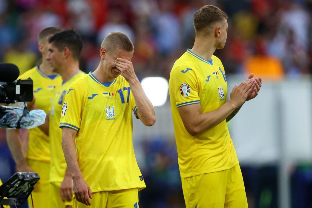 乌克兰成为首支取得4分仍遭淘汰的球队。——照片：路透社